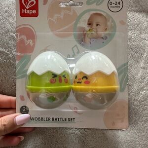 Hape Egg Wobble Rattle Set - Green and Yellow nwt